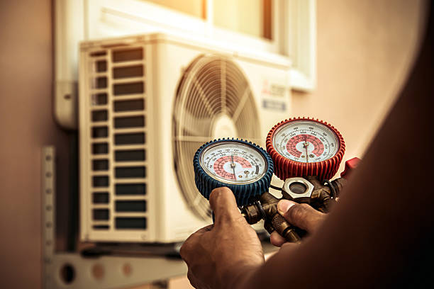 Professional Hvac technician working in Centerport, NY